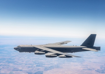 A B-52 from Edwards AFB flies over the desert of Southern California