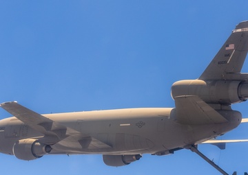 A KC-10 Extender from Travis AFB flies over the desert of Southern California