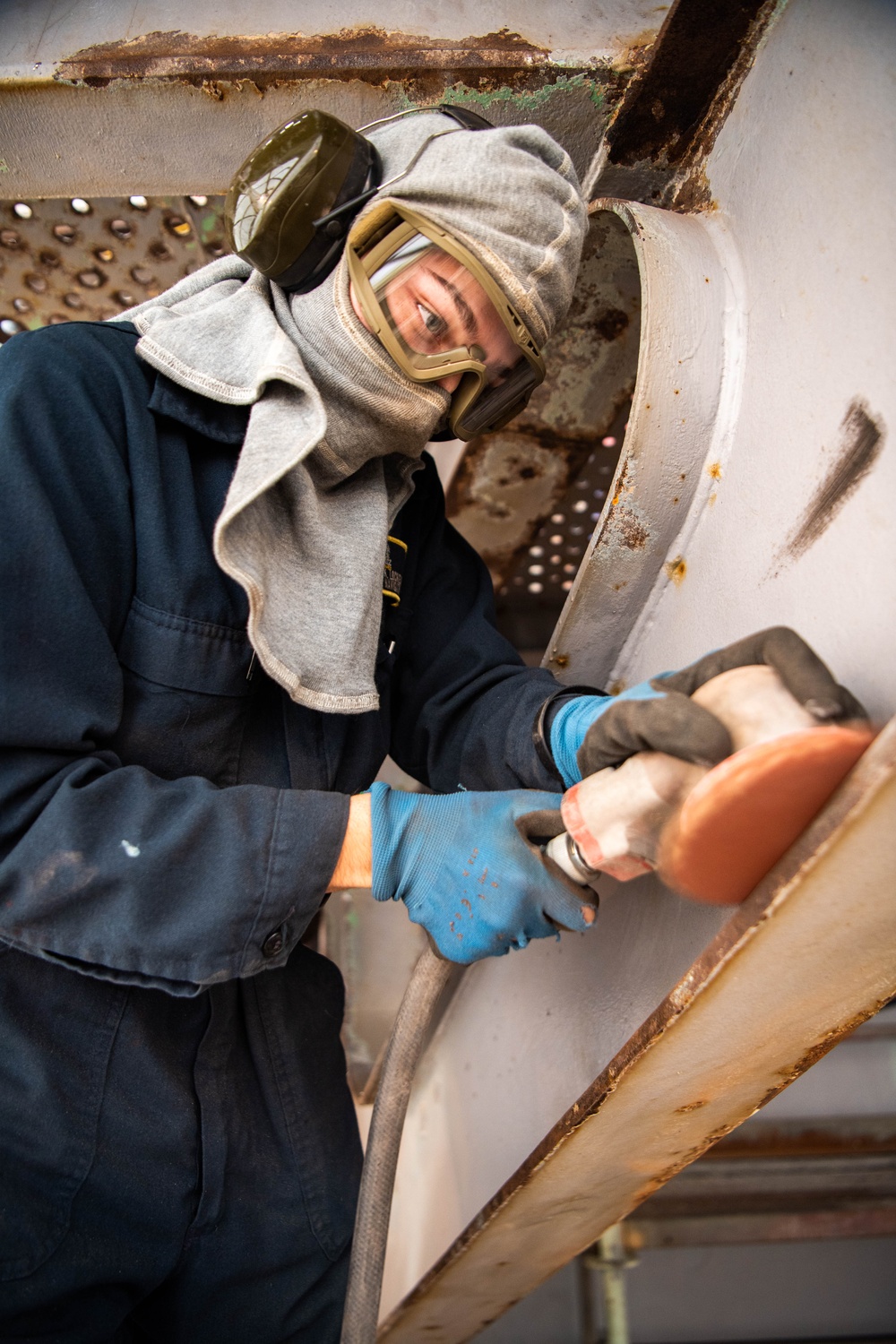 Sailor Performs Corrosion Control