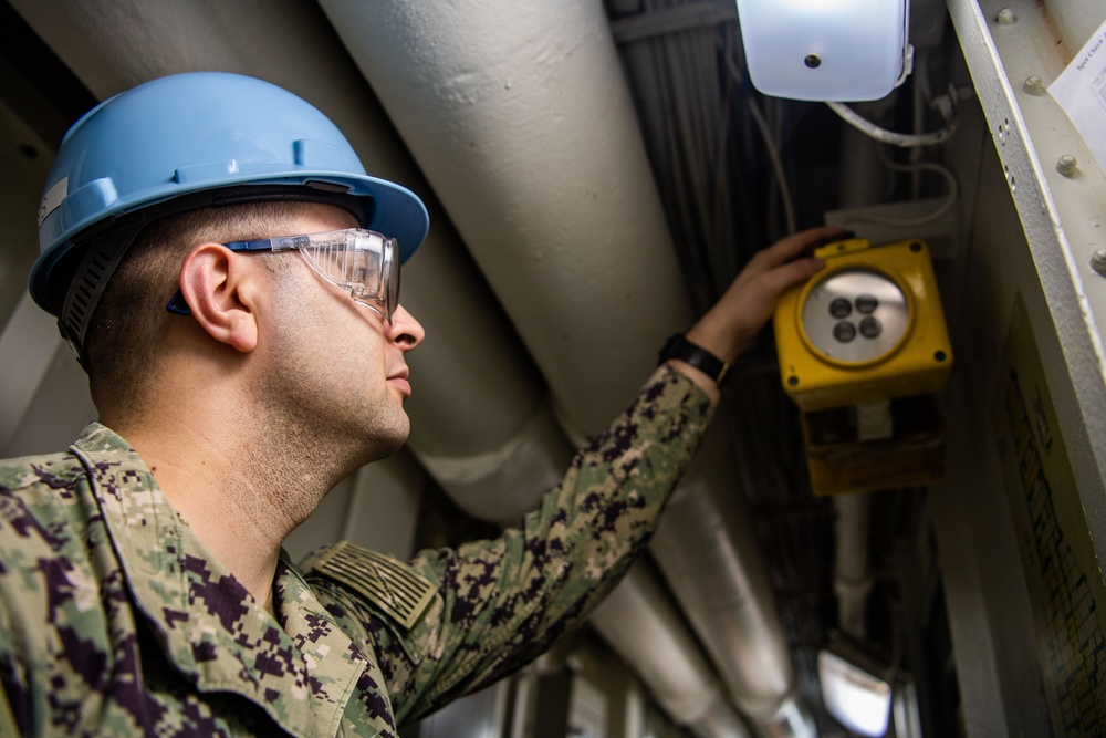 Sailor Conducts Safety Check