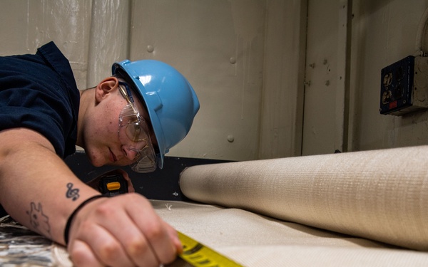 Sailor Prepares For Lagging