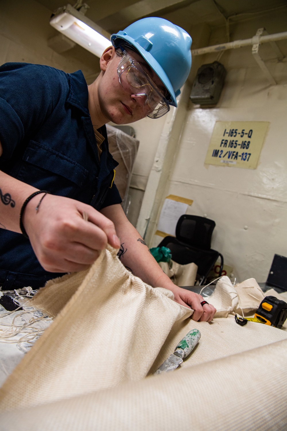 Sailor Prepares For Lagging