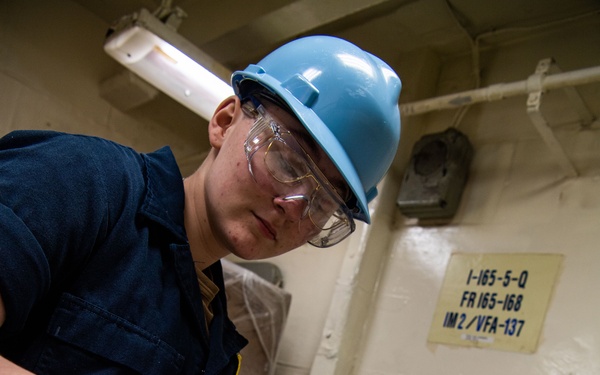 Sailor Prepares For Lagging