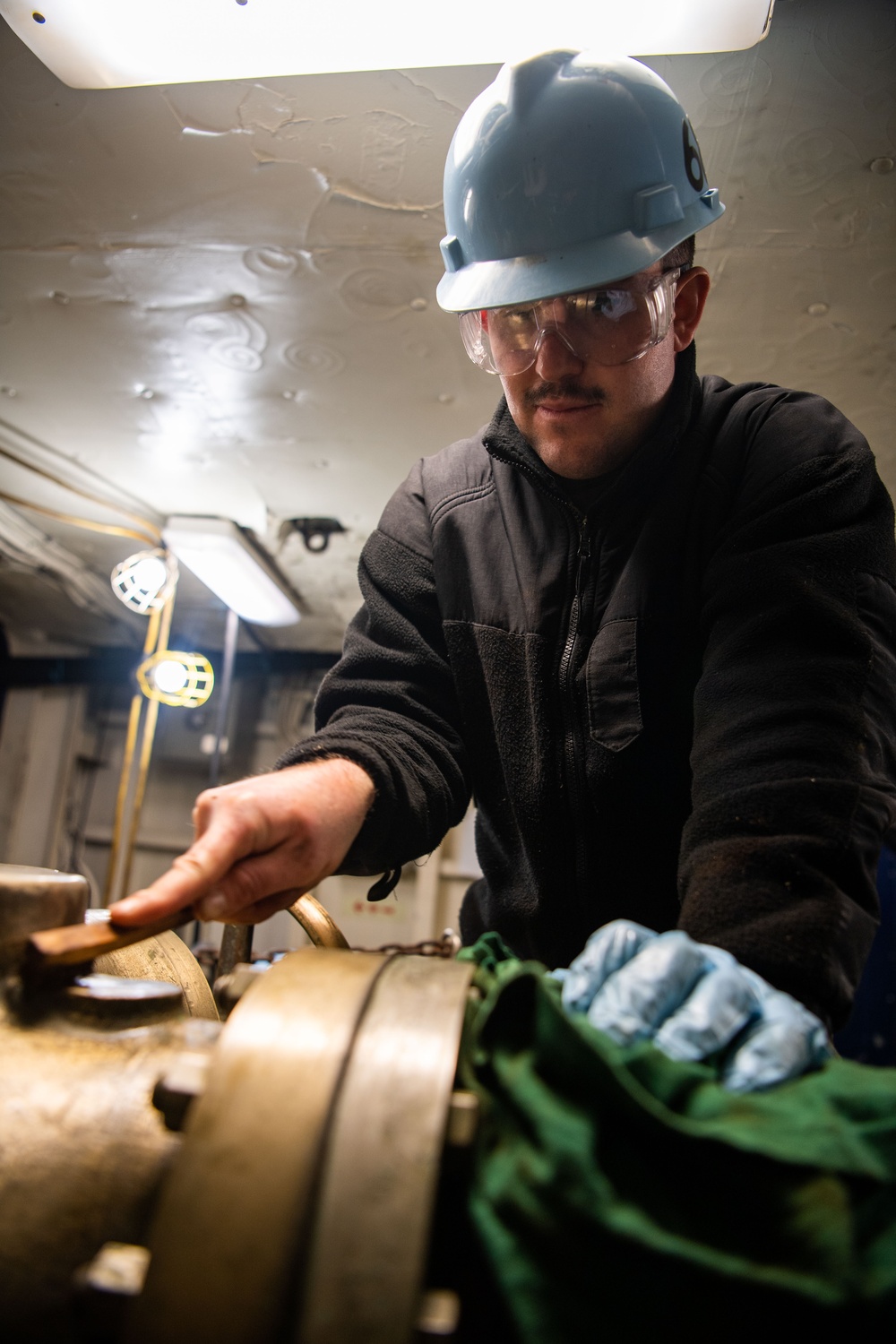 Sailor Conducts Corrosion Control