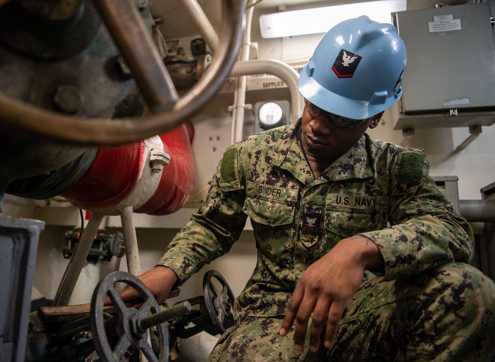 Sailor Conducts Corrosion Control