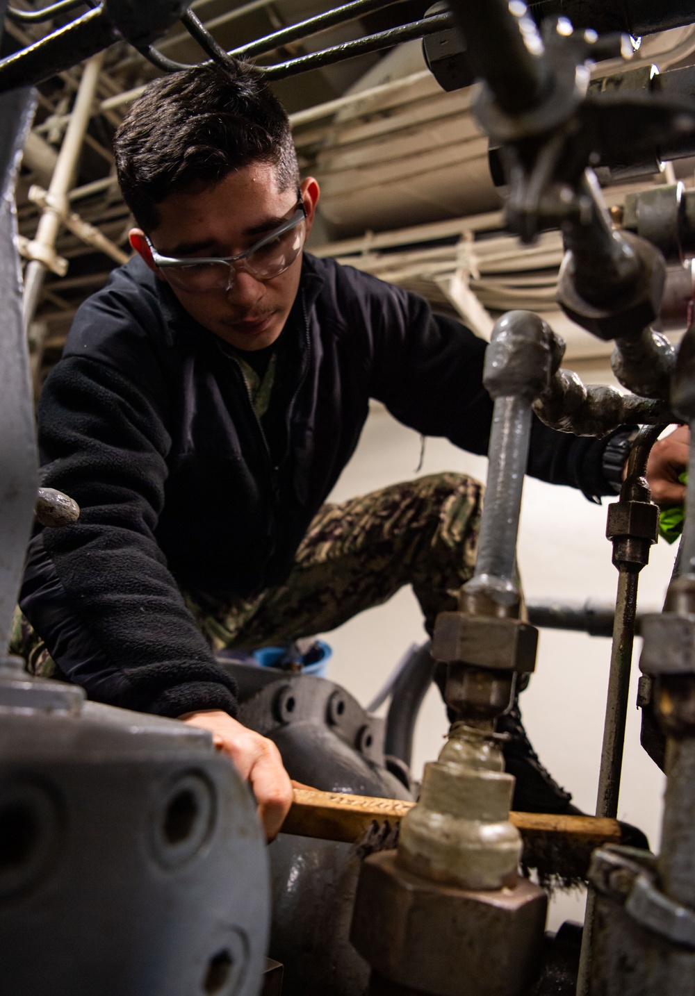 Sailor Conducts Corrosion Control