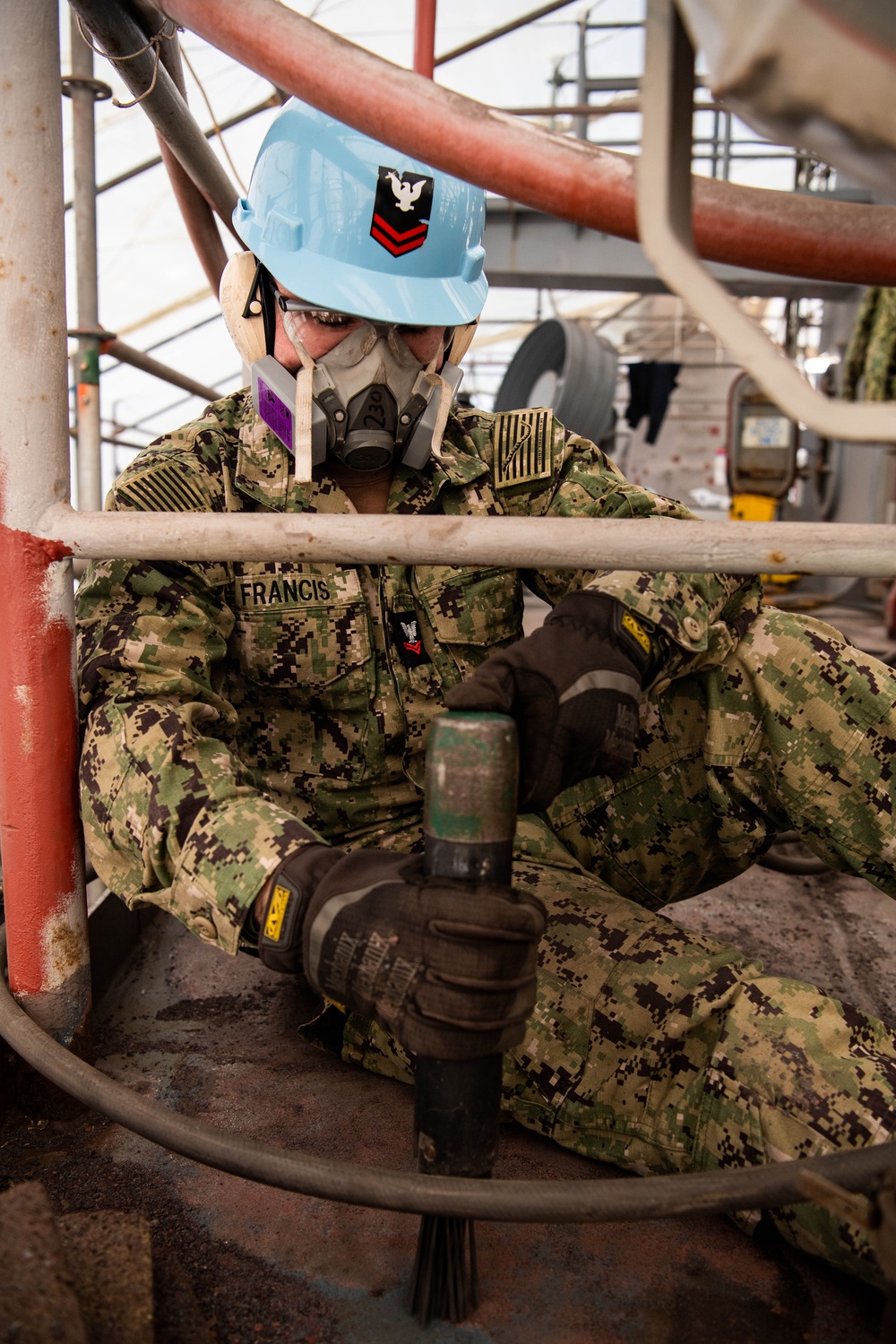 Sailor Conducts Corrosion Control