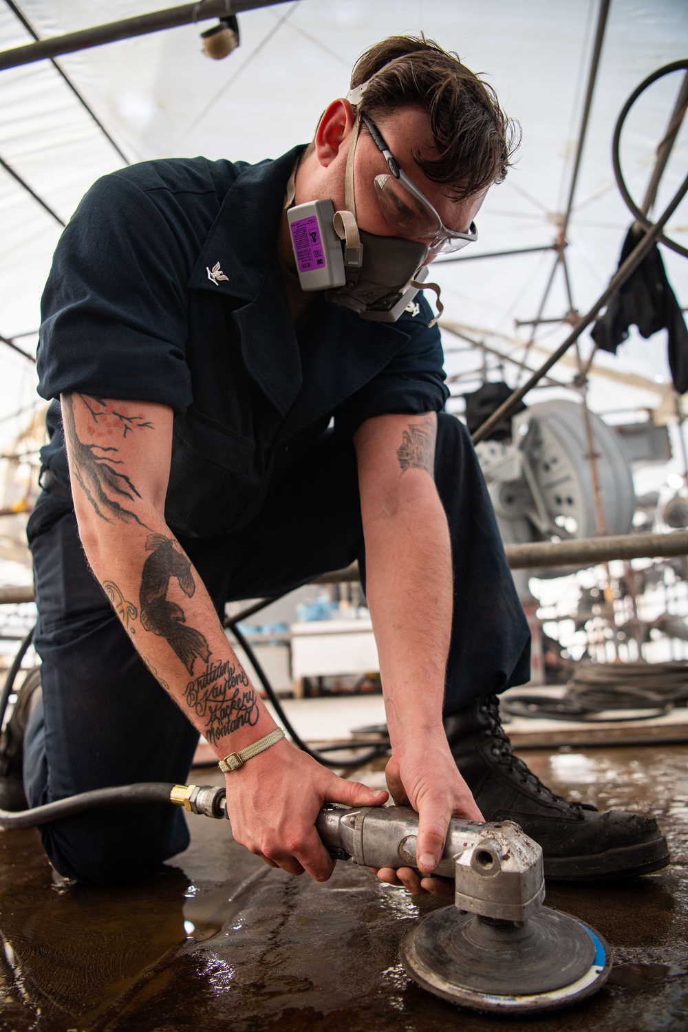 Sailor Conducts Corrosion Control