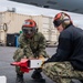 Sailors Hitch F/A-18F