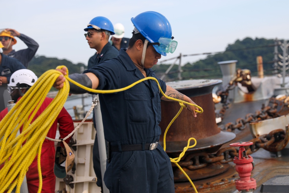 Sailors aboard the USS Howard conduct a sea and anchor detail in Yokosuka, Japan