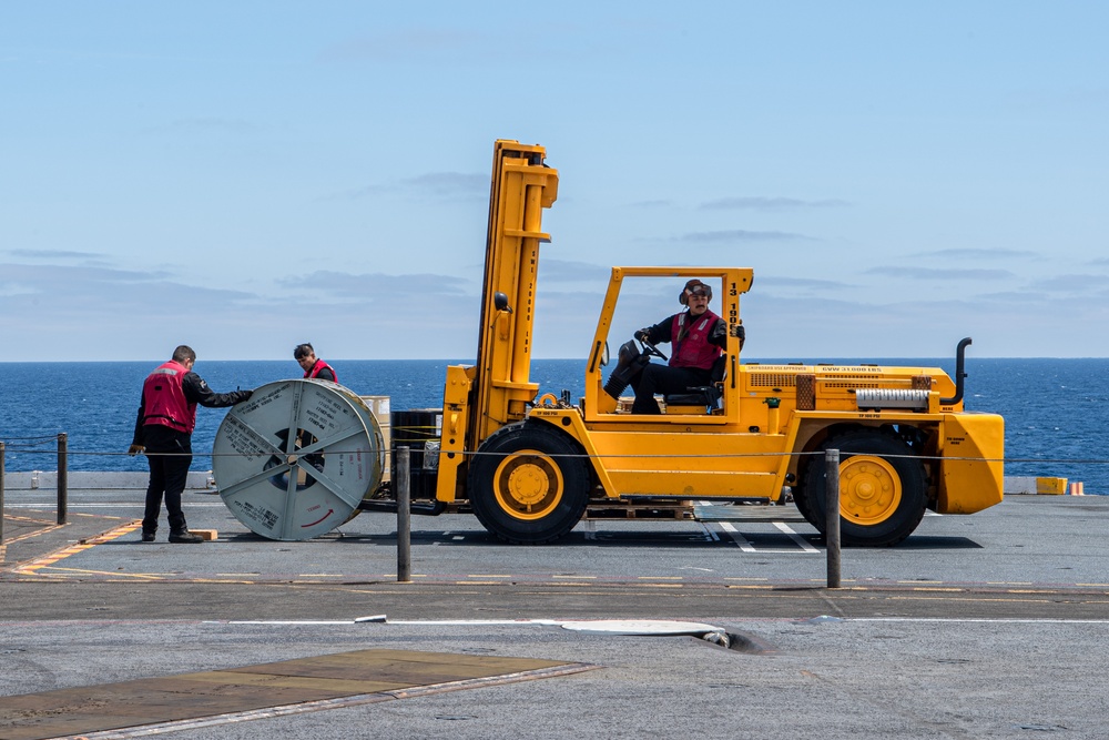 Sailors Move Equipment