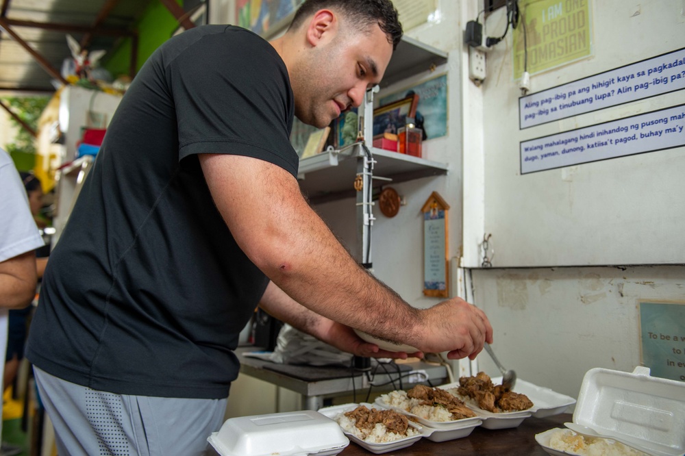 Blue Ridge Sailors serve the community at local Philippine Soup Kitchen