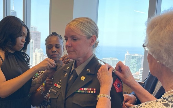 Gold Star Family Pins Rank on National Guard Colonel and Friend