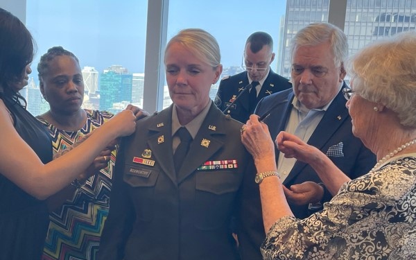 Gold Star Family Pins Rank on National Guard Colonel and Friend