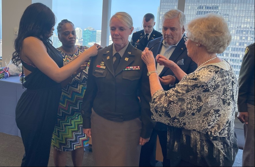 Gold Star Family Pins Rank on National Guard Colonel and Friend