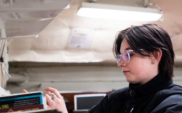 Sailor Organizes Books