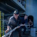 Sailors Heave Around Mooring Line