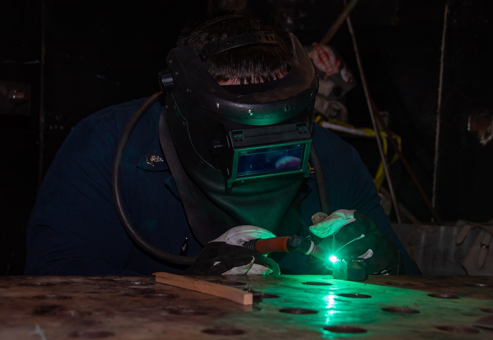 United States Navy Sailor Fabricates A Piping System Cap