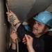 Sailor Replaces Gasket in Weapons Elevator