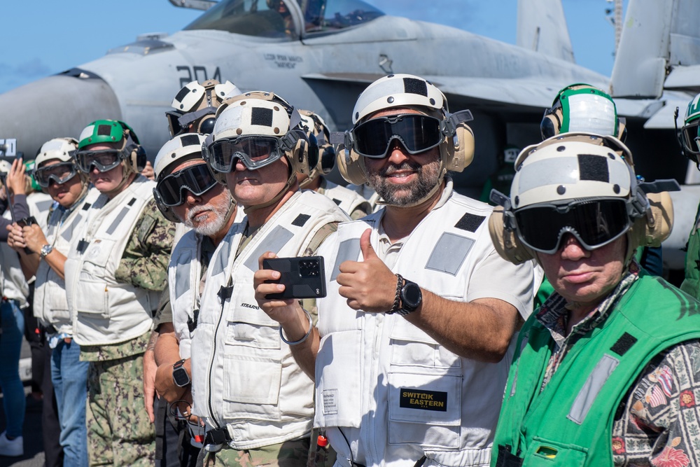 USS Ronald Reagan (CVN 76) hosts tour for Rep. James Moylan, Guam Chamber of Commerce representatives, and military leaders