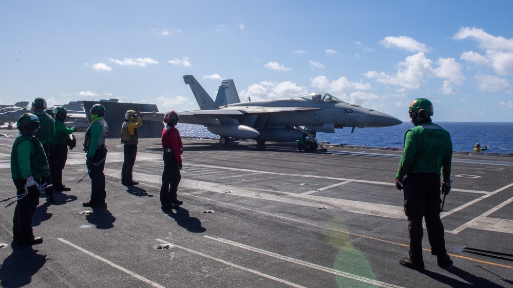 USS Ronald Reagan (CVN76) Sailors conduct flight deck operations