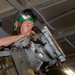USS Ronald Reagan (CVN 76) Sailors perform maintenance on helicopters
