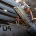 USS Ronald Reagan (CVN 76) Sailors perform maintenance on helicopters