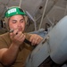 USS Ronald Reagan (CVN 76) Sailors perform maintenance on helicopters