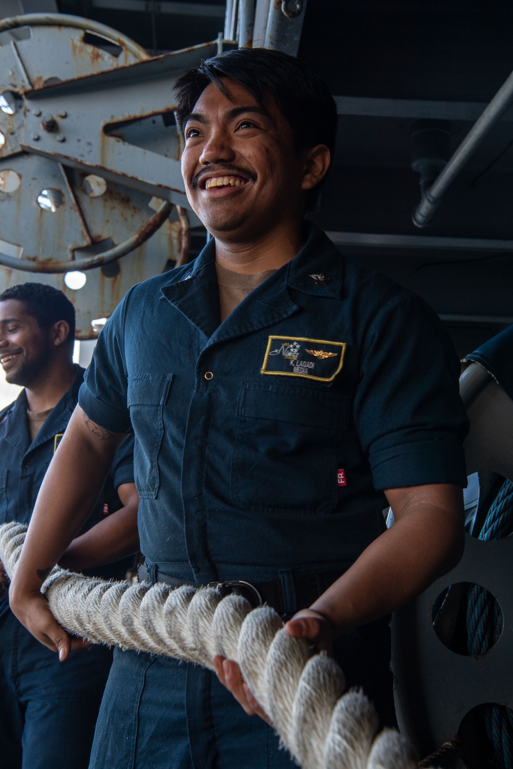 Sailor Handles a Mooring Line