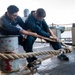 Sailors Handle Mooring Lines