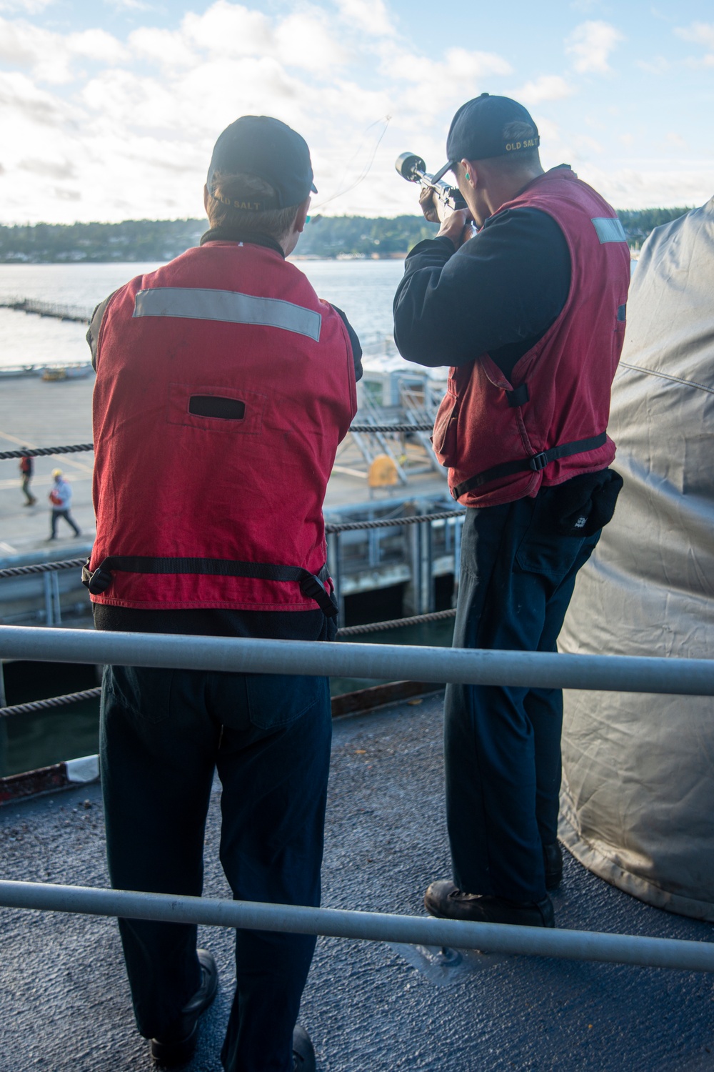 Sailors Fire Shotline From Fantail