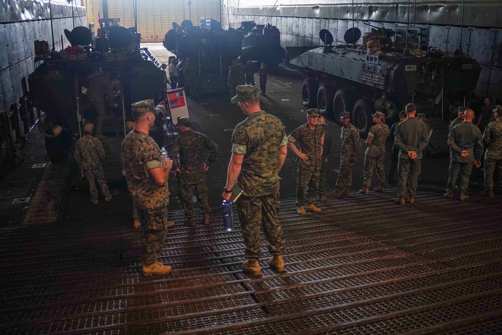 240620 – Distinguished Visitors Board USS Harpers Ferry at Okinawa, Japan