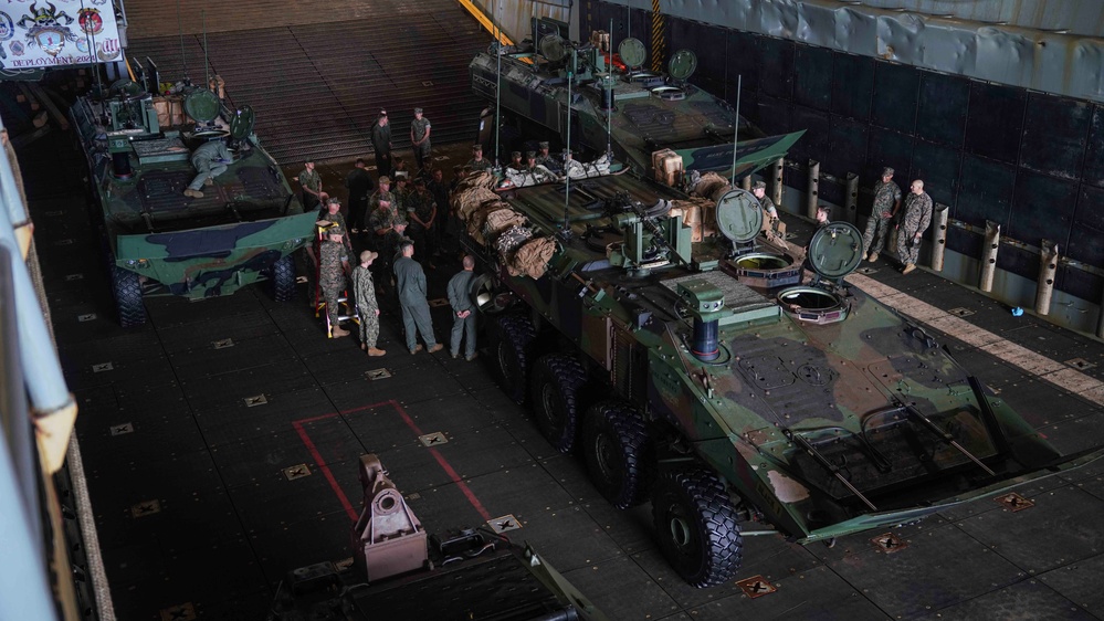 240620 – Distinguished Visitors Board USS Harpers Ferry at Okinawa, Japan