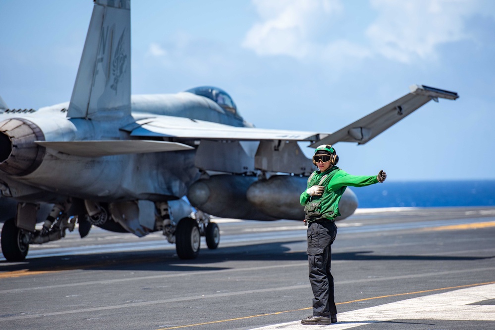 USS Ronald Reagan (CVN76) Sailors conduct flight deck operations