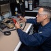 USS Ronald Reagan (CVN 76) Sailors repair equipment