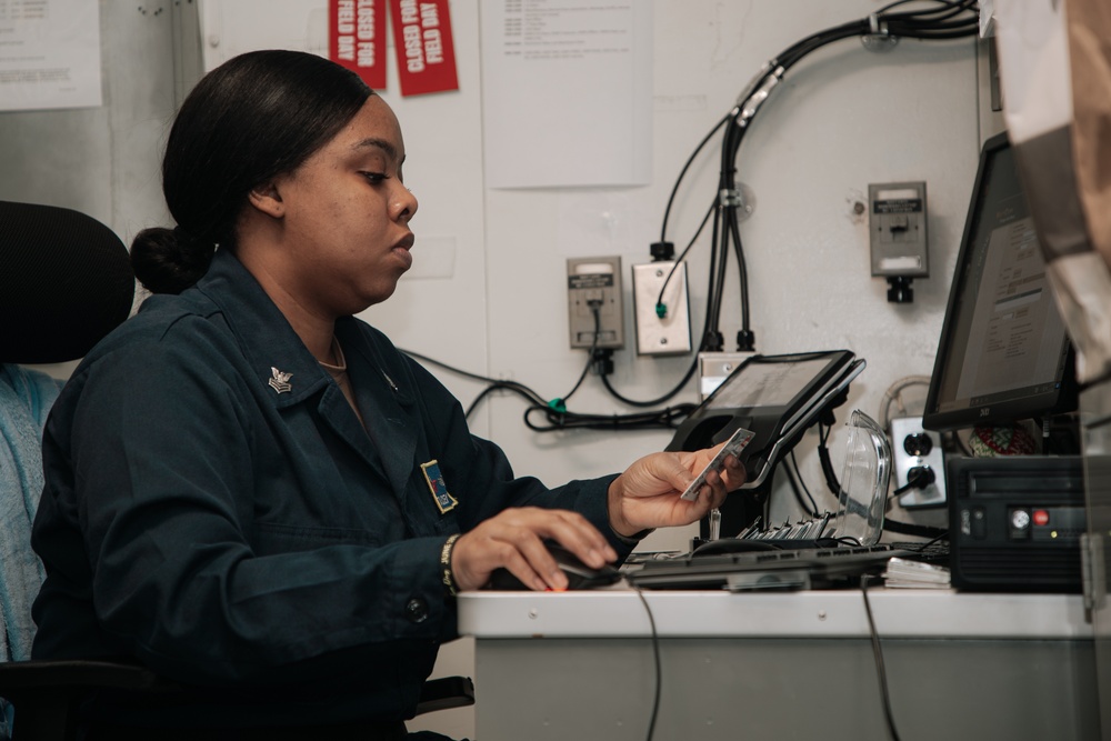 USS George Washington disbursing office at work