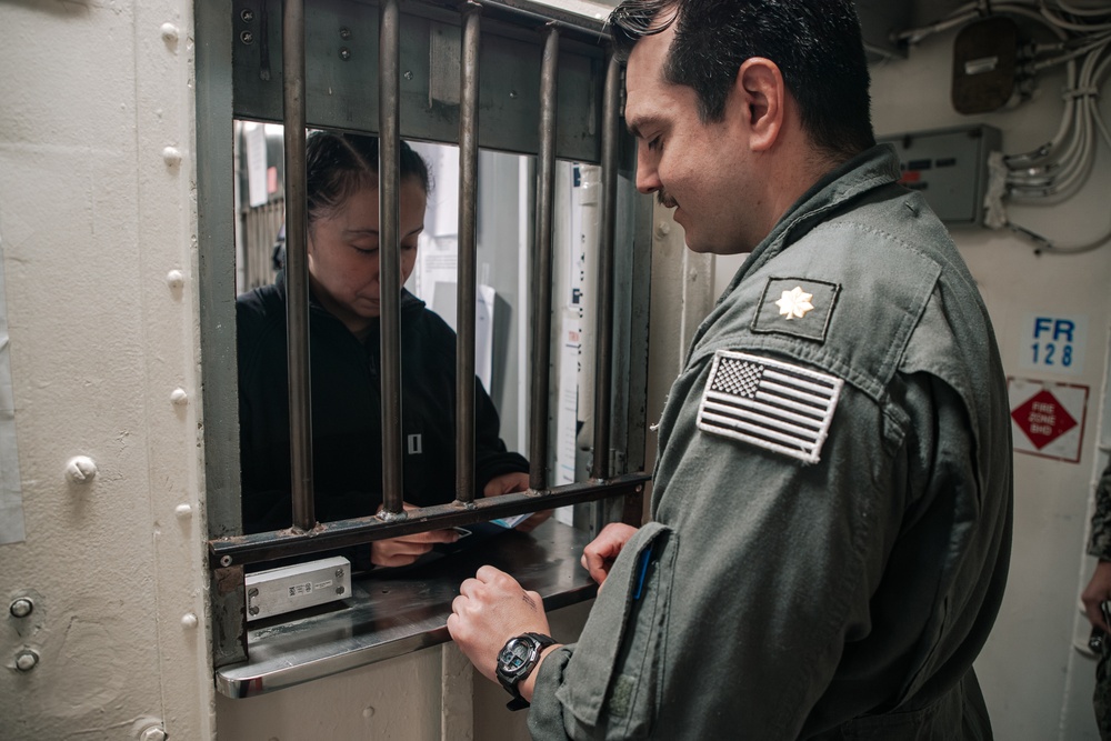 USS George Washington disbursing office at work