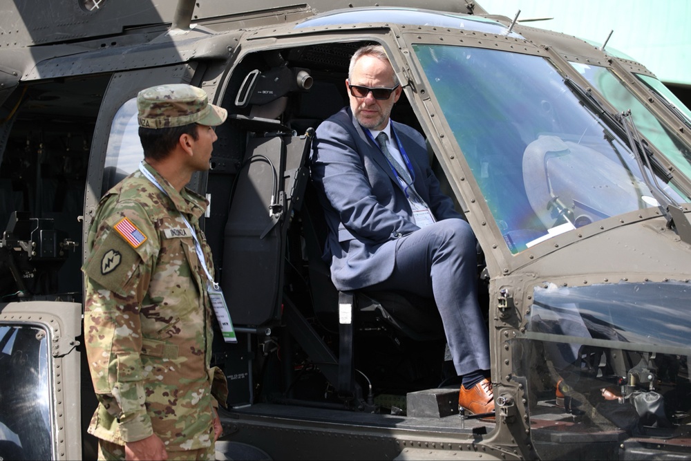 Deputy Chief of Mission David McCawley speaks to 3rd ABCT soldiers at EUROSATORY 2024