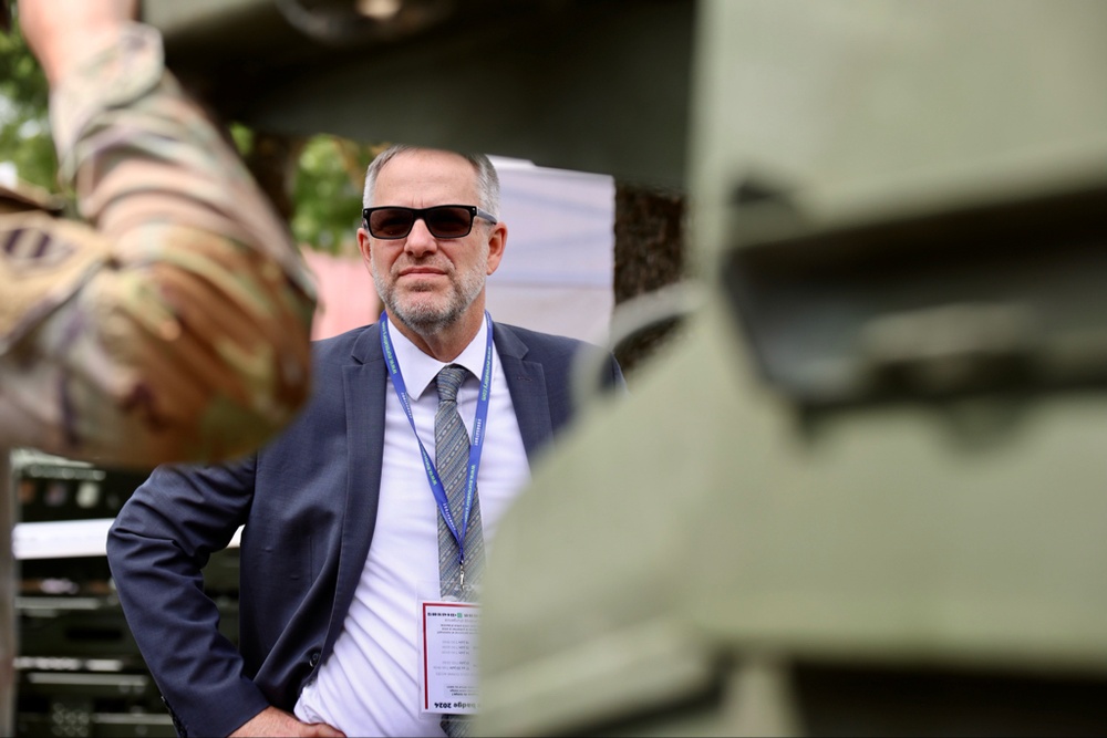 Deputy Chief of Mission David McCawley speaks to 3rd ABCT soldiers at EUROSATORY 2024