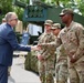 Deputy Chief of Mission David McCawley speaks to 3rd ABCT soldiers at EUROSATORY 2024