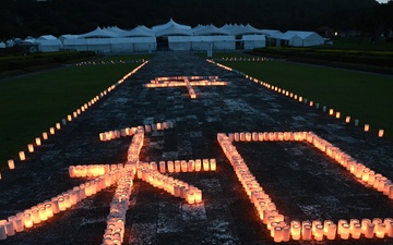 U.S. Navy volunteers commemorate Battle of Okinawa at Peace Memorial Park candle lighting