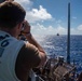 USS Ronald Reagan (CVN 76) conducts a fueling-at-sea and replenishment-at-sea with USNS Rappahannock (T-AO 204) and USNS Cesar Chavez (T-AKE-14)