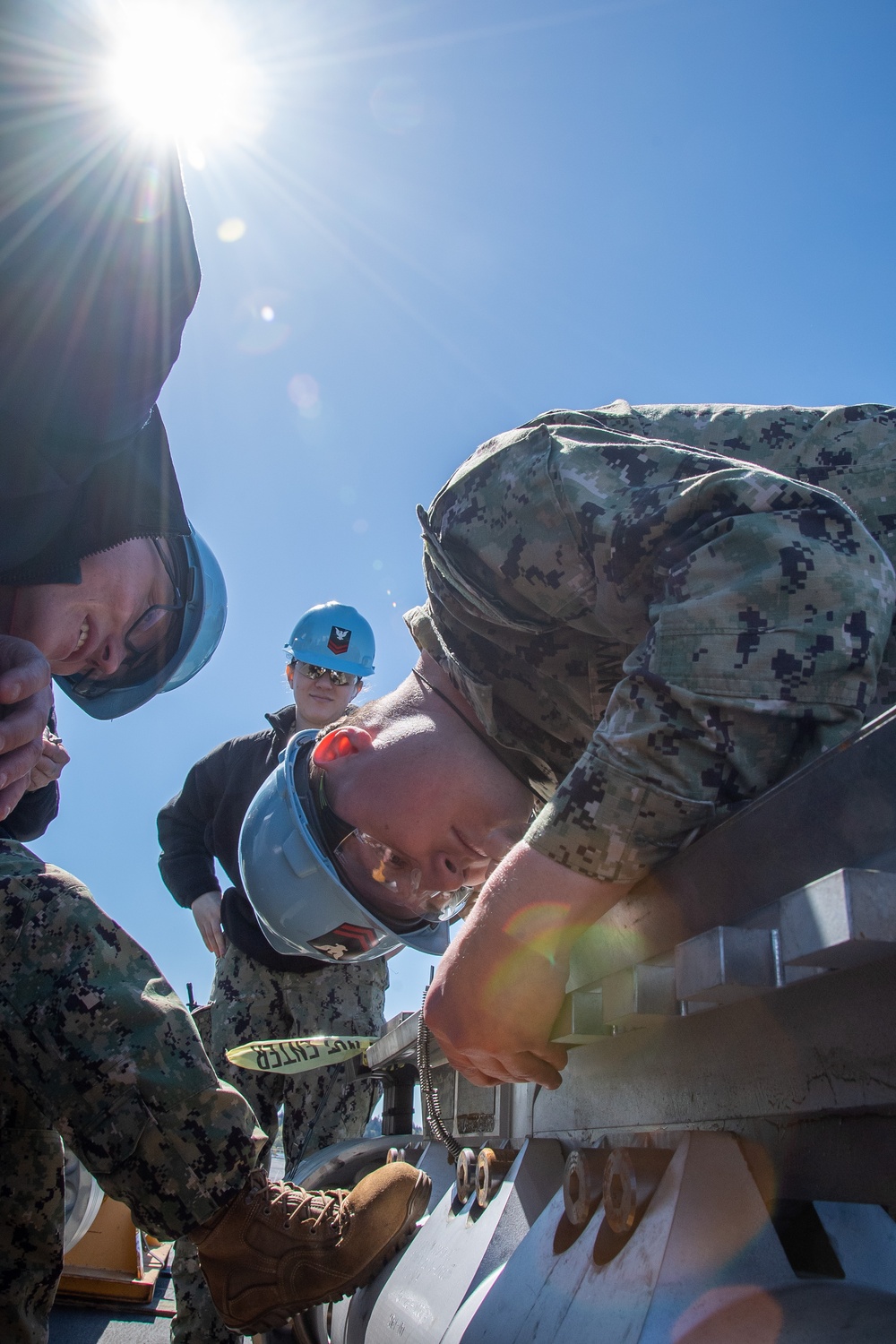 Sailors Inspect Pistons