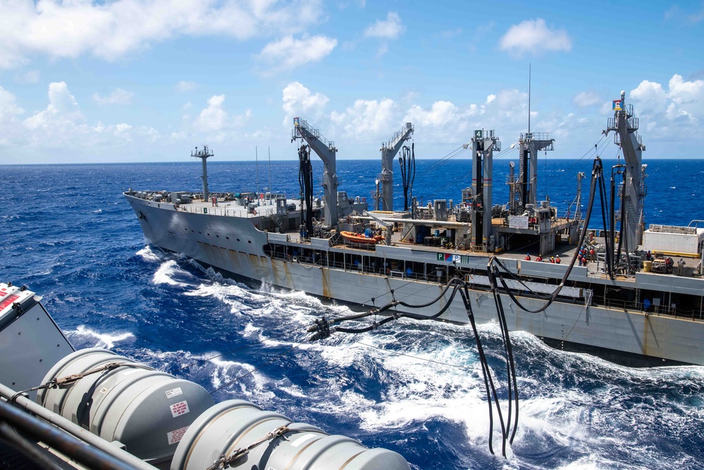 USS Ronald Reagan (CVN 76) conducts a fueling-at-sea and replenishment-at-sea with USNS Rappahannock (T-AO 204) and USNS Cesar Chavez (T-AKE-14)