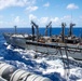 USS Ronald Reagan (CVN 76) conducts a fueling-at-sea and replenishment-at-sea with USNS Rappahannock (T-AO 204) and USNS Cesar Chavez (T-AKE-14)