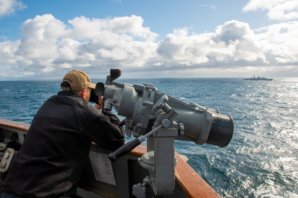 Sailor Surveys Ship