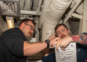 Sailors Study for Enlisted Surface Warfare Specialist Test