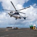 USS Ronald Reagan (CVN 76) conducts a fueling-at-sea and replenishment-at-sea with USNS Rappahannock (T-AO 204) and USNS Cesar Chavez (T-AKE-14)