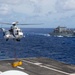 USS Ronald Reagan (CVN 76) conducts a fueling-at-sea and replenishment-at-sea with USNS Rappahannock (T-AO 204) and USNS Cesar Chavez (T-AKE 14)