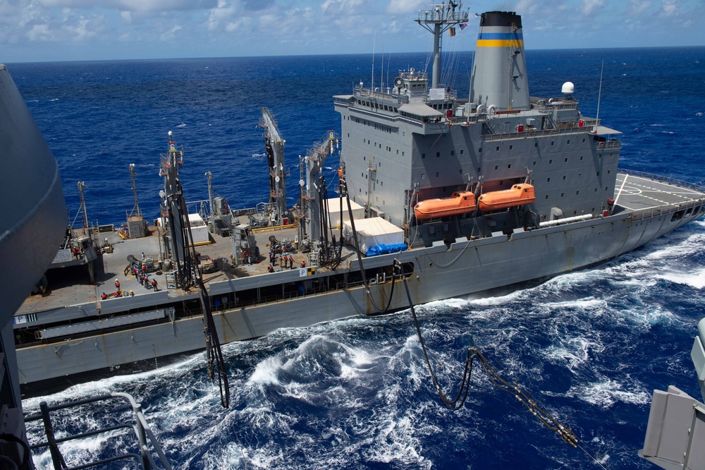 USS Ronald Reagan (CVN 76) conducts a fueling-at-sea and replenishment-at-sea with USNS Rappahannock (T-AO 204) and USNS Cesar Chavez (T-AKE 14)